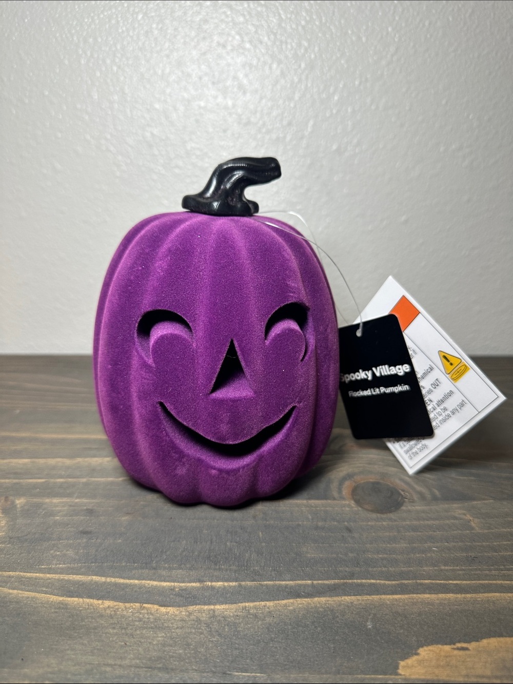 Purple pumpkin decoration with light